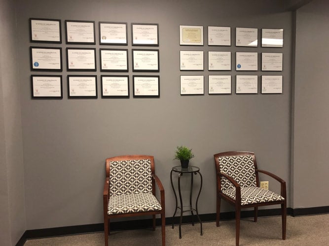 Chiropractic Overland Park KS Credential Wall